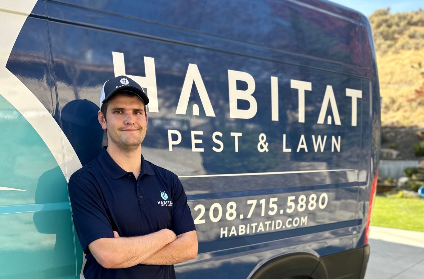 A Habitat Pest & Lawn technician inspecting a home in Garden City, ID for signs of rodent activity, using advanced tools for precise detection and removal.